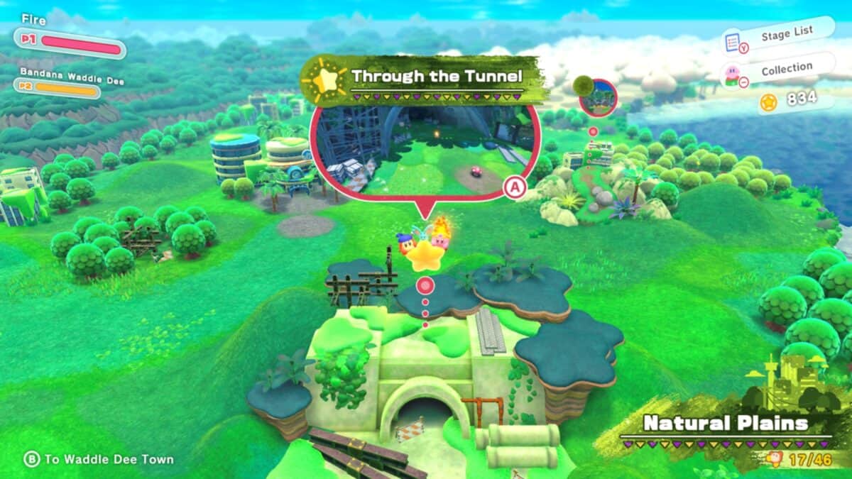 Kirby floating with a fire ability over a scenic green landscape. Text bubble says "Through the Tunnel." Background shows a path, trees, and Waddle Dee Town information.