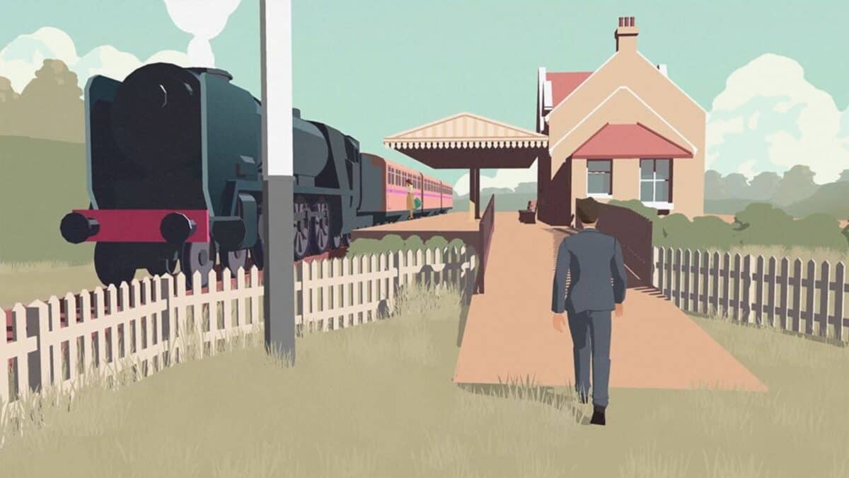 A man in a suit walks toward a small rural train station with a steam train stopped at the platform on a clear day.