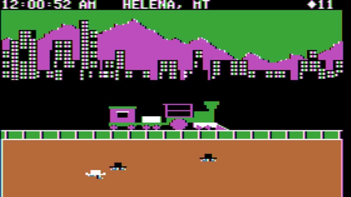 Pixelated computer game scene showing a train on tracks, two figures on the ground, city buildings, and purple mountains in the background; text reads "12:00:52 AM HELENA, MT $11.