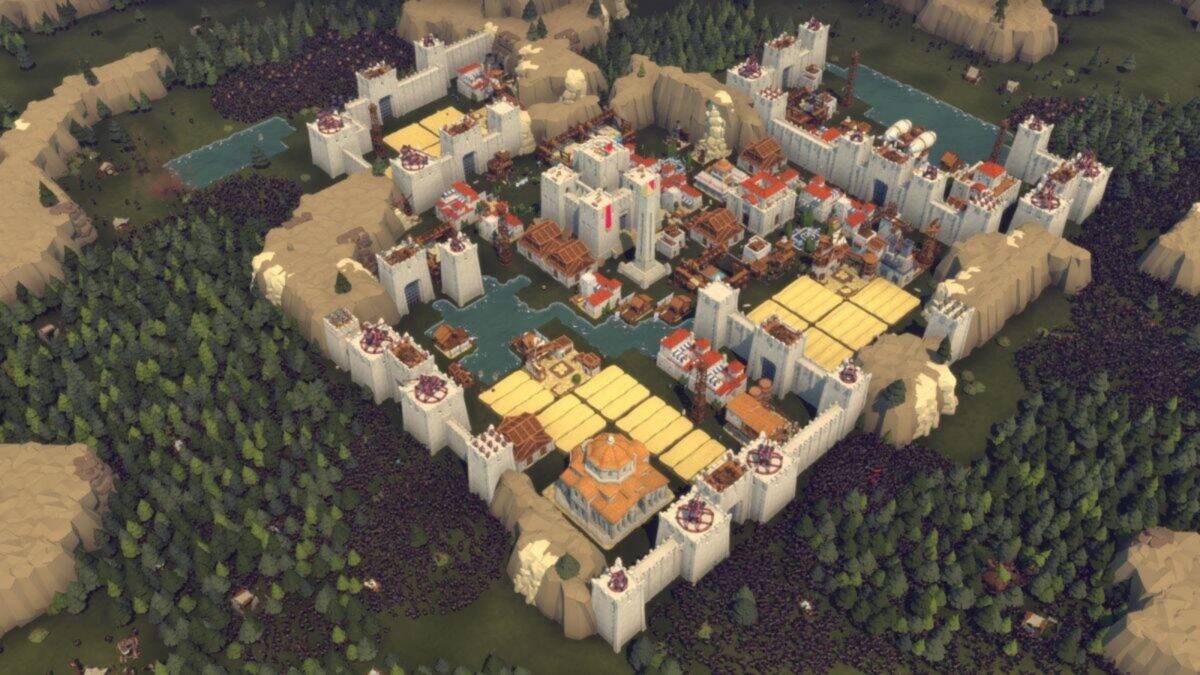 Aerial view of a walled medieval-style city with multiple towers, buildings, waterways, and surrounding forests.