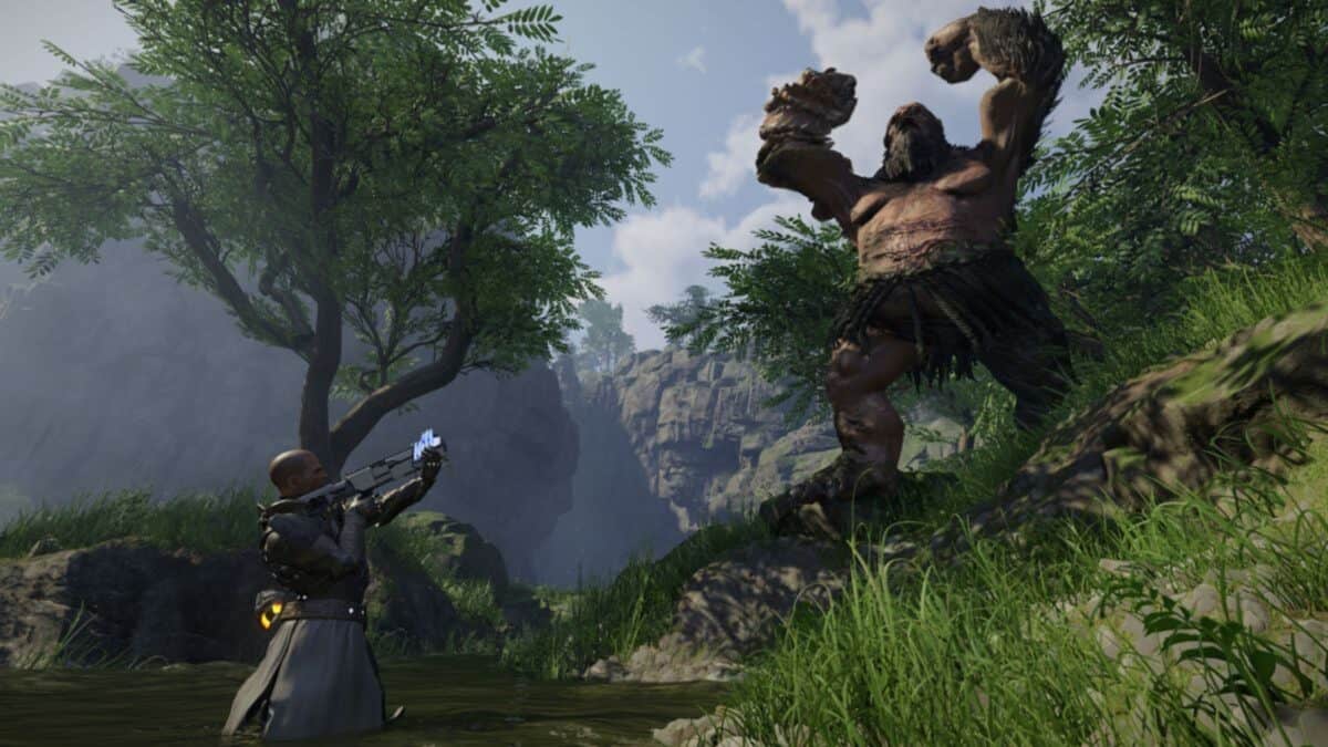 A person aims a futuristic weapon at a large, menacing creature with raised fists in a lush, rocky outdoor landscape.