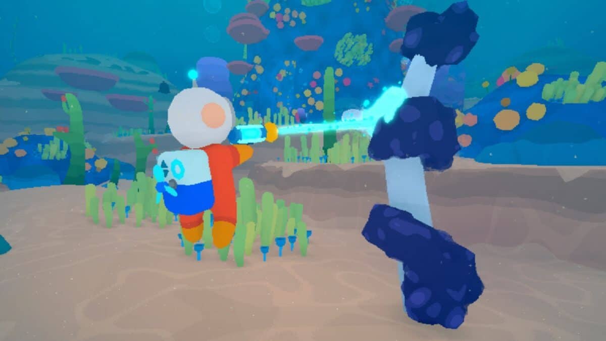 A cartoon diver in a red suit uses a glowing tool underwater surrounded by colorful plants and rocks.