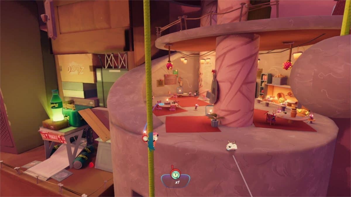 A whimsical, animated scene features a spiral building interior with cozy rooms, cluttered surfaces, and small cartoon creatures climbing or exploring various objects.