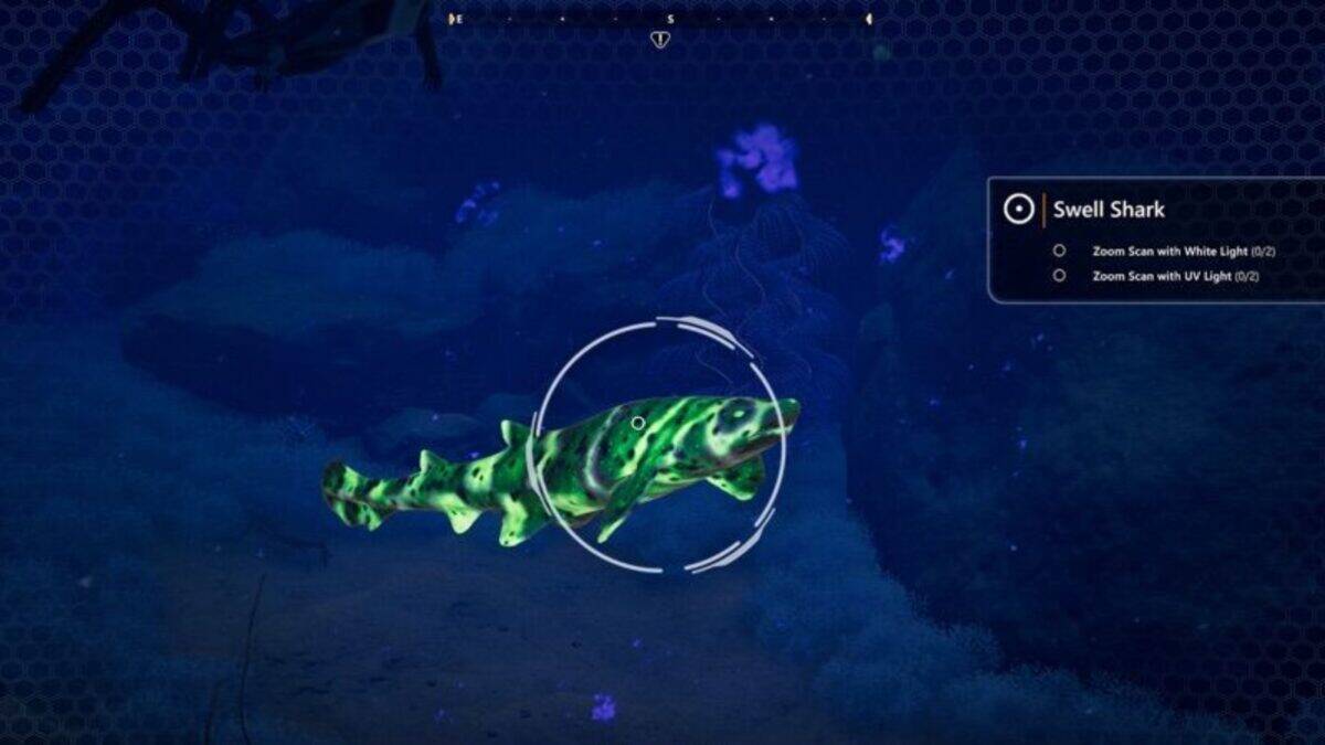 Screenshot from a video game showing a green and black patterned swell shark centered in a scanning reticle with menu options on the right.