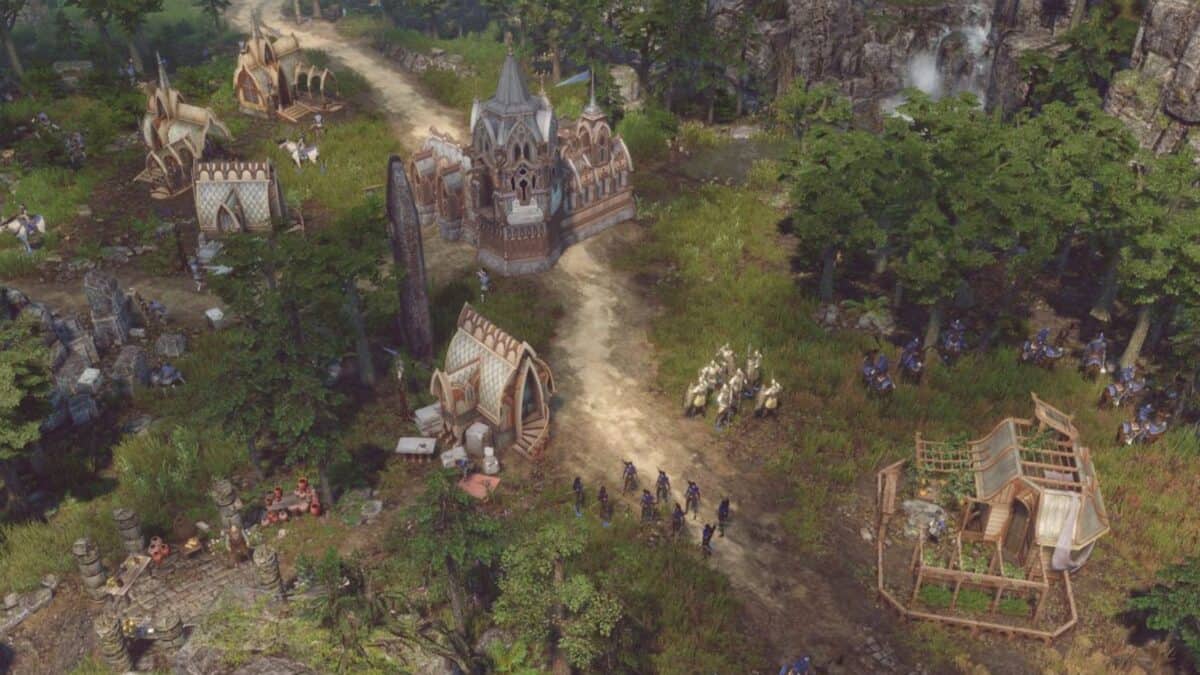 A top-down view of a fantasy-themed village with ornate buildings, groups of people, trees, and a dirt path winding through the scene.
