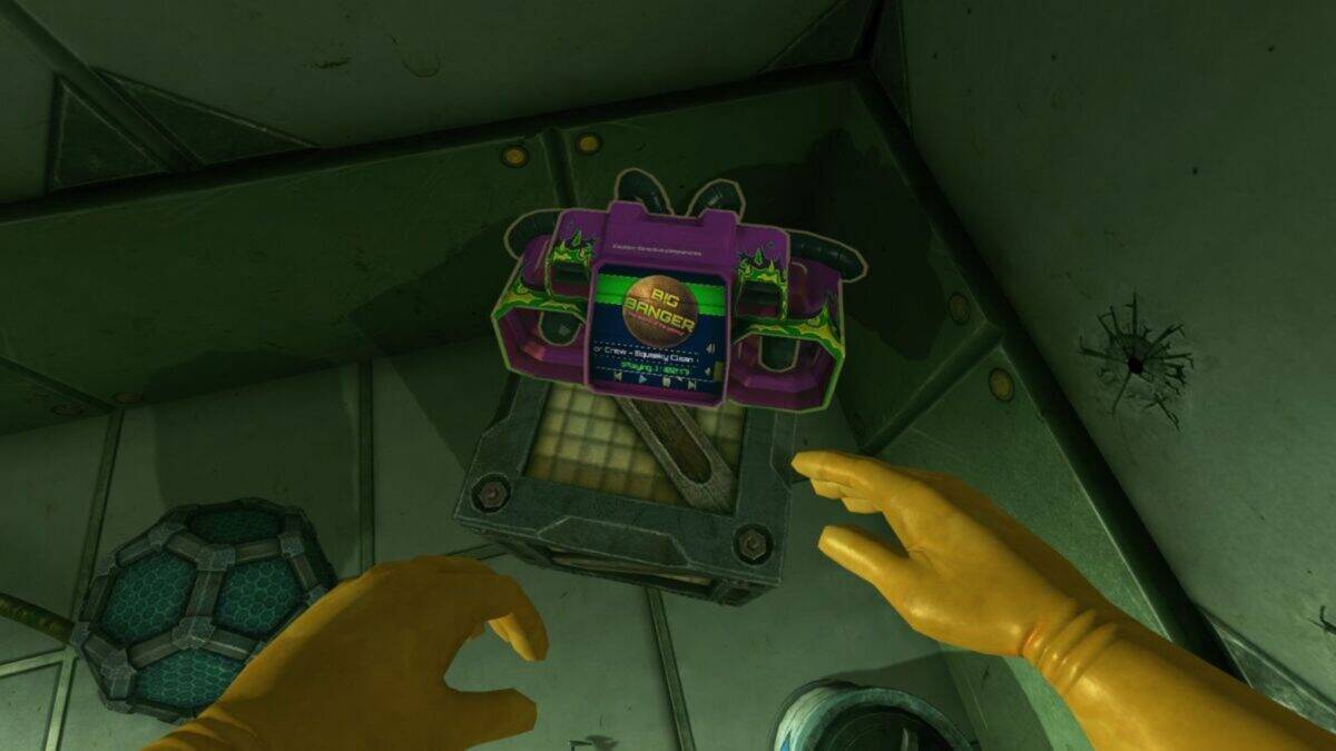 Gloved hands reach toward a purple device labeled "Big Banger" with neon green accents, set against a metallic, industrial background.