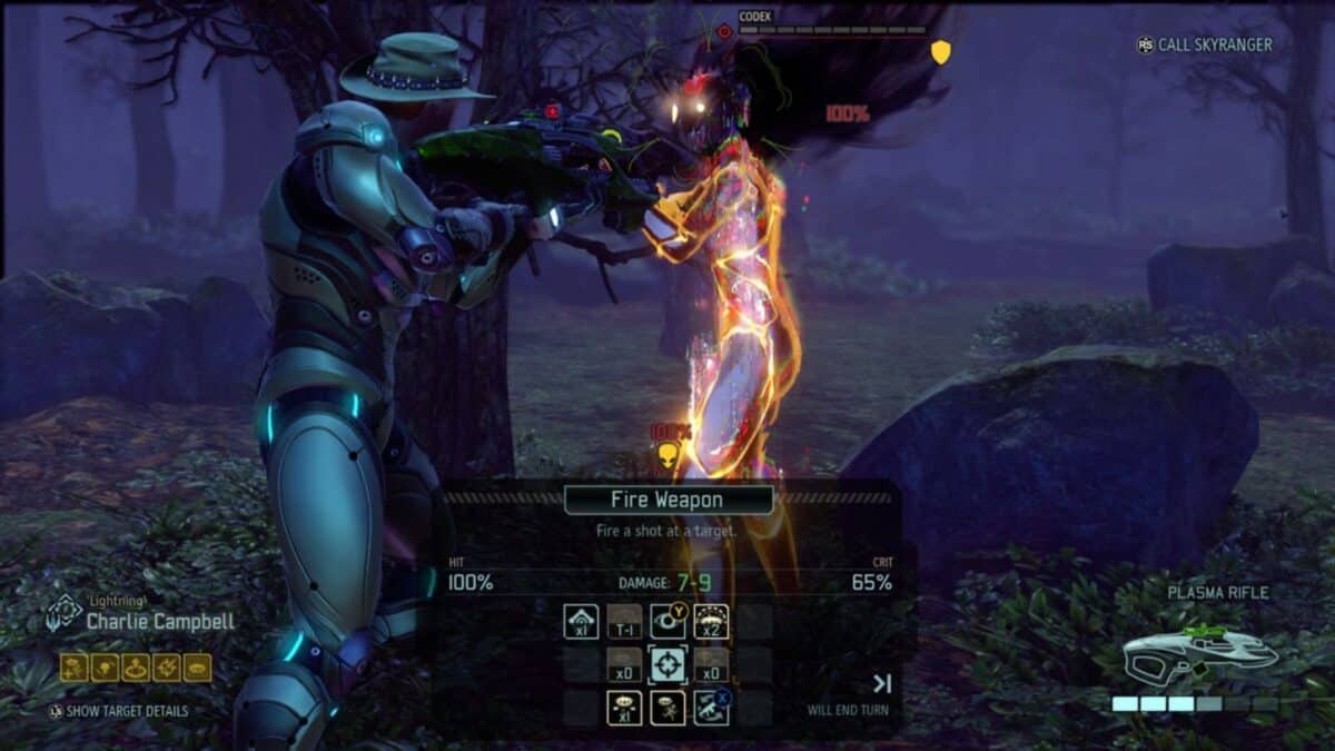 A player in futuristic armor aims a plasma rifle at a glowing enemy in a forest setting in the video game XCOM 2, with combat options displayed on screen.