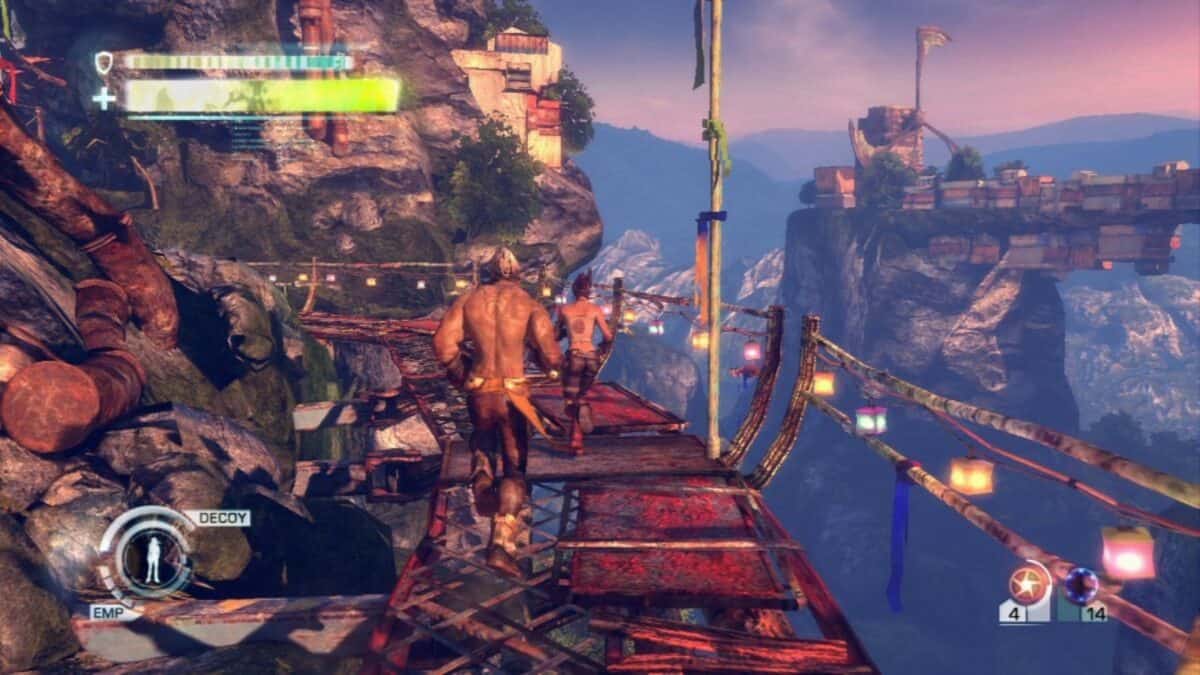 Two characters walk on a damaged rope bridge over a canyon in a video game, with user interface elements and distant cliffs visible in the background.