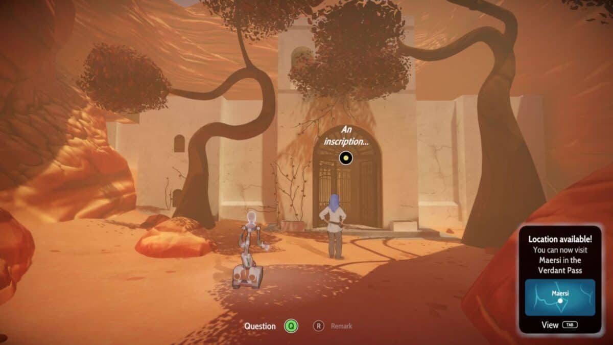 A robot and a person stand in front of a large, white building with twisted trees in a desert setting; on-screen text indicates a new location is available.